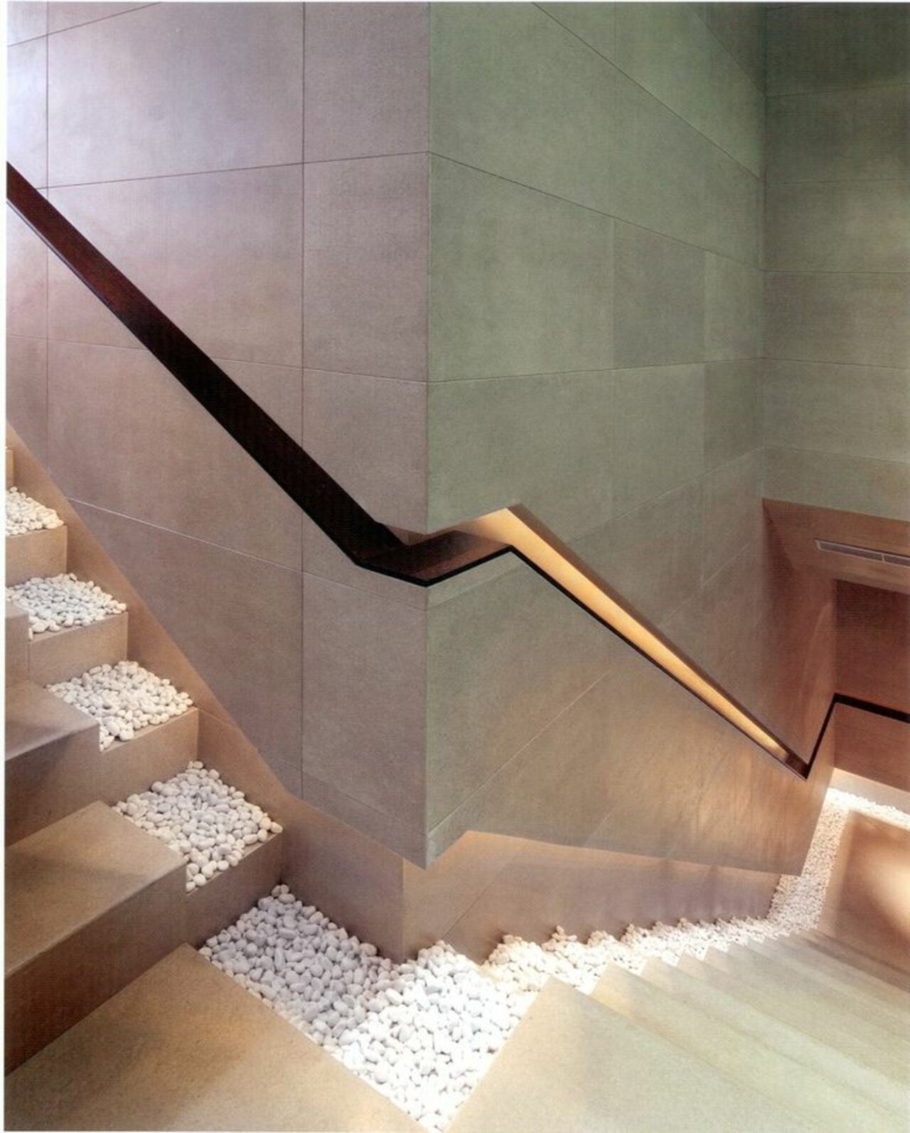 A recessed handrail and white pebbles create an amazing #zen ambiance for this #staircase https://t.co/hJdhX16PfV
