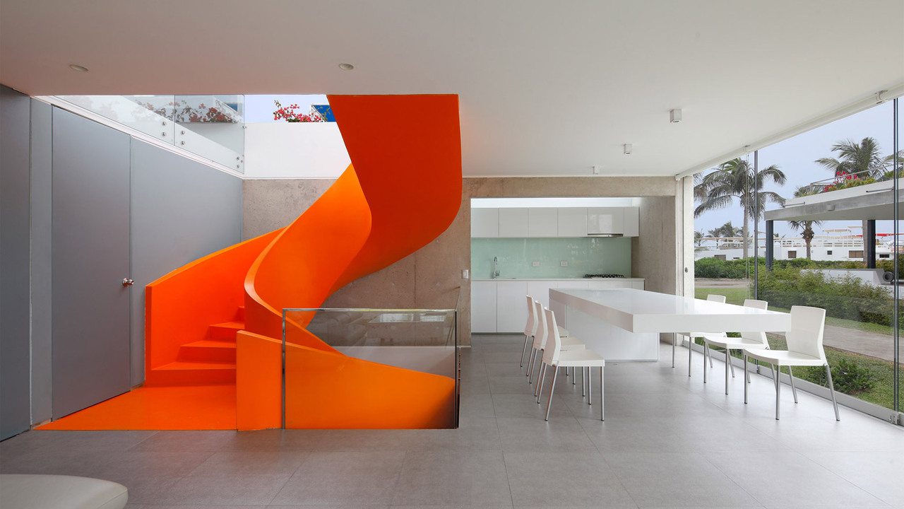 Martin Dulanto installs vibrant orange staircase inside Peruvian house Casa Blanca
