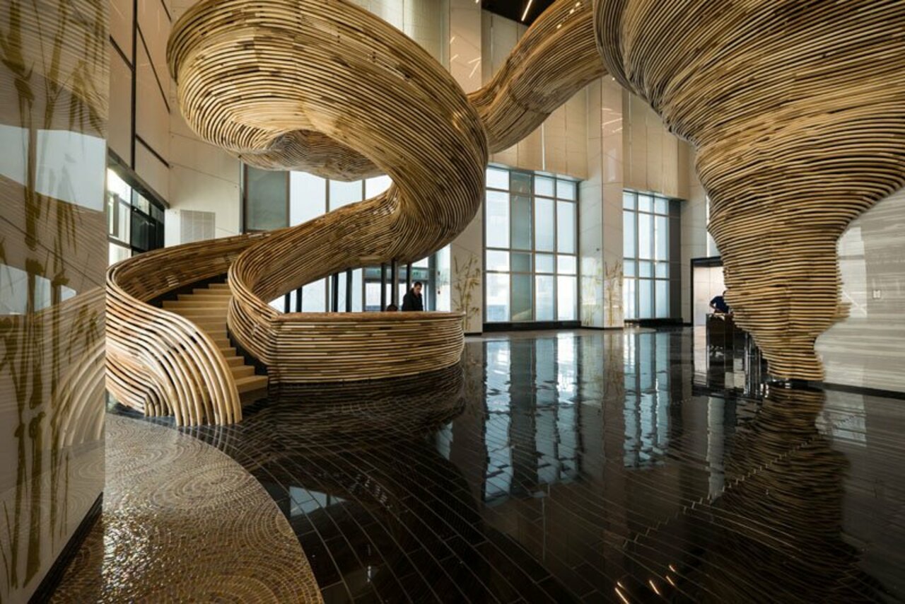 We are completely fascinated by this sculptural spiral #staircase http://ow.ly/jFj33027NBx Via @CONTEMPORIST #design https://t.co/w9v5BVdPbi